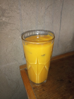 A picture of Mango grapes melon and banana smoothie.