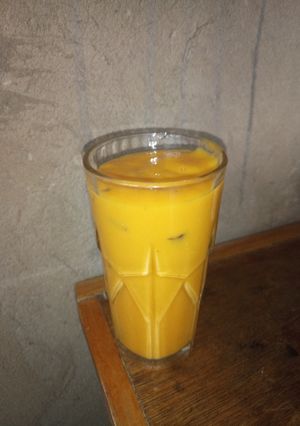 A picture of Mango grapes melon and banana smoothie.