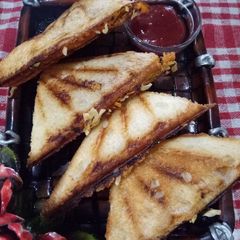 A picture of Cheese vegetable grilled sandwich.
