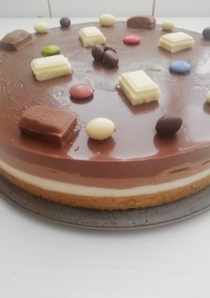 Una foto de Tarta tres chocolate
