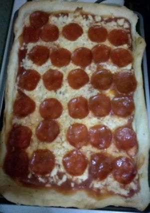Una foto de Pizza casera de peperoni