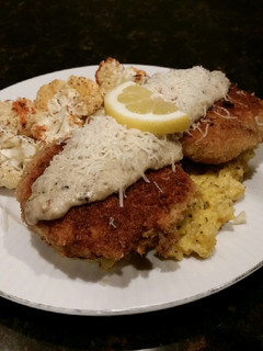 A picture of Brad's stuffed salmon cakes with lemon basil bechamel sauce.