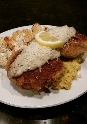 A picture of Brad's stuffed salmon cakes with lemon basil bechamel sauce.