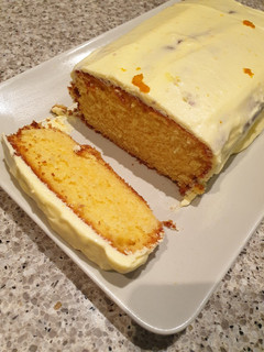 A picture of Orange cake with Orange icing.
