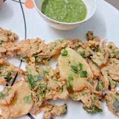 Potatoes spinach onion bhajiya A picture of Potatoes spinach onion bhajiya.