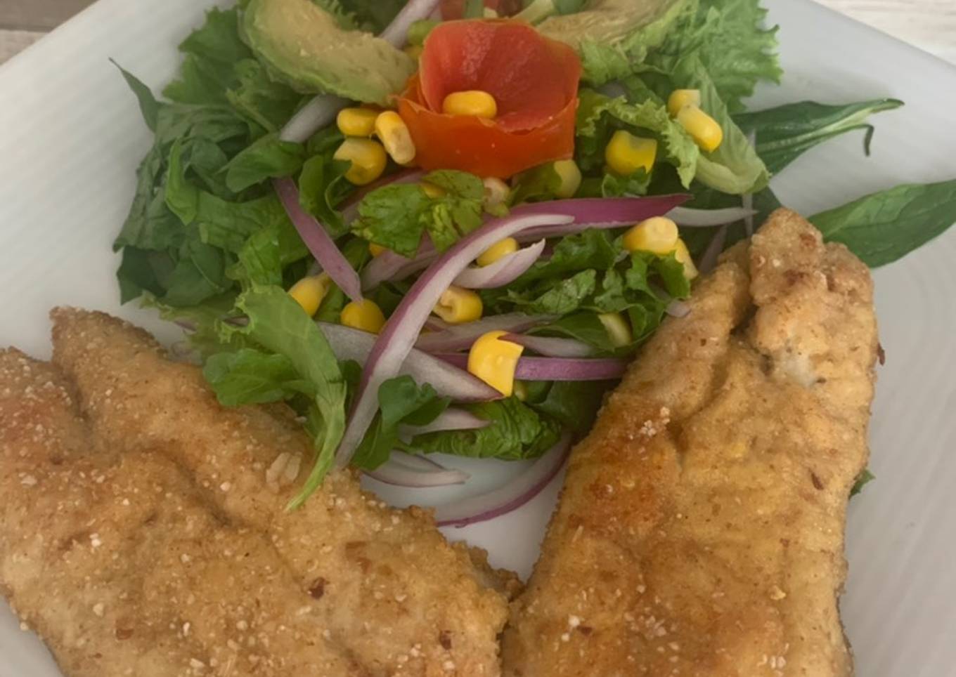 Filete de pescado al curry empanizado con harina de avena y amaranto, hechas en horno