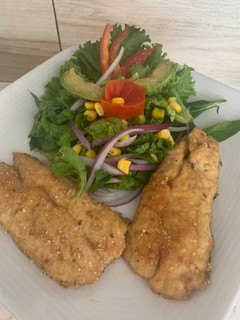 Una foto de Filete de pescado al curry empanizado con harina de avena y amaranto, hechas en horno