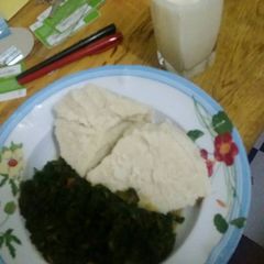 A picture of Ugali and veges.