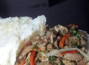 Una foto de Árepas rellenas de cerdo salteado y vejetales