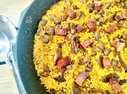 Una foto de mollejas de pollo con arroz