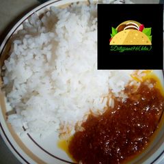 A picture of White rice with stew.