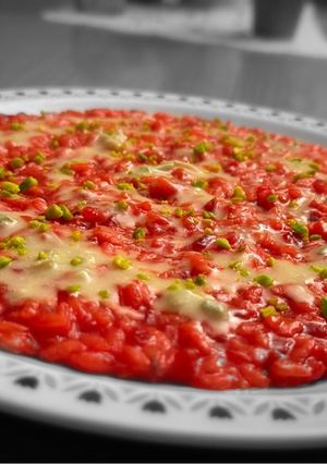 Foto di Risotto rapa rossa, fonduta al gorgonzola e granella di pistacchi 🫕