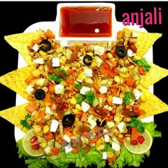 A picture of Crunchy Munchy protein salad with Nachos.