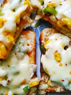 এগ ব্রেড পিজ্জা(egg bread pizza recipe in Bengali) রেসিপির প্রধান ছবি