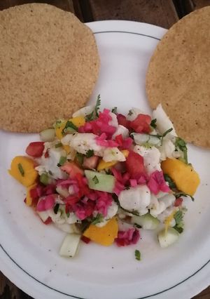 Una foto de Ceviche de pescado con mango