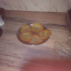 A picture of Navratri special aalu ke malpuye.