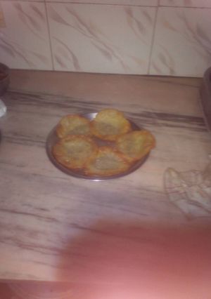 A picture of Navratri special aalu ke malpuye.