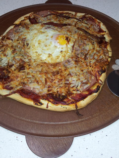 Una foto de Pizza con masa comprada
