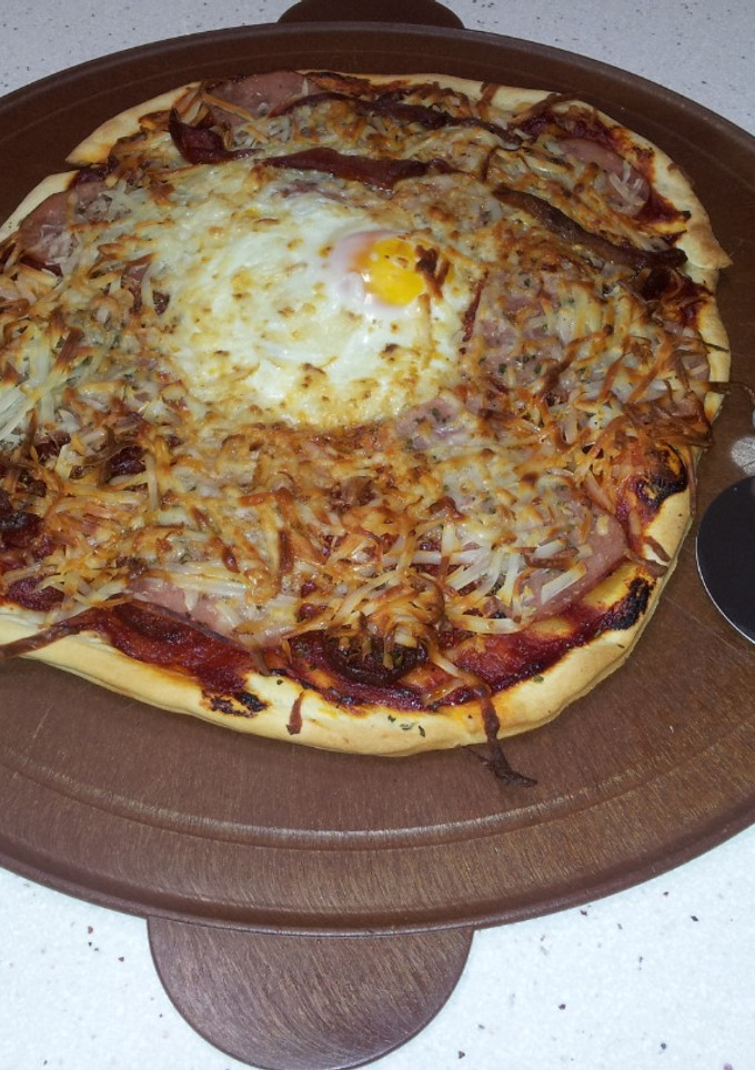 Una foto de Pizza con masa comprada