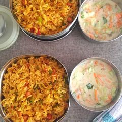 A picture of Veg Masala bhath and Cucumber Carrot Raita.
