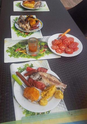 Una foto de Parrillada de carne y pescado