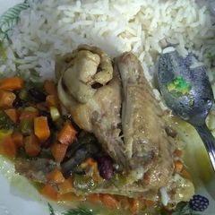 Curry sauce with boiled rice and chicken A picture of Curry sauce with boiled rice and chicken.