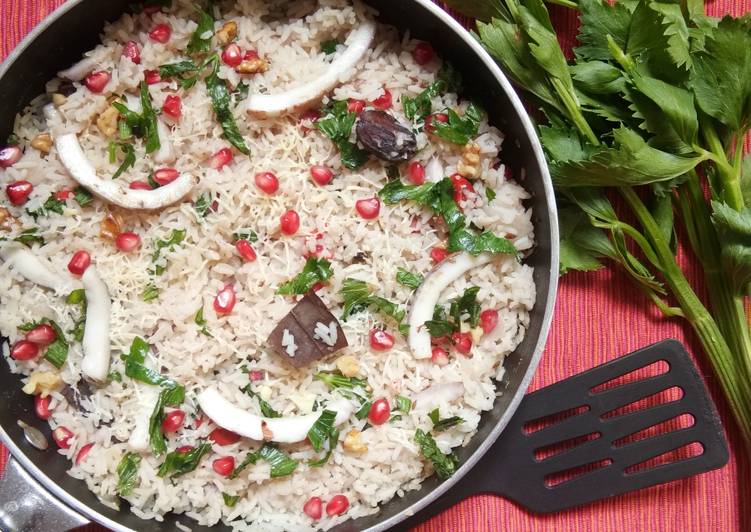 Tender coconut and pomegranate cheesy pulao