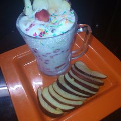 A picture of Fruits and nuts cup.