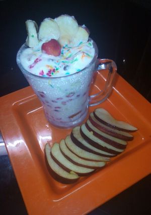 A picture of Fruits and nuts cup.