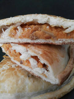 Una foto de Empanada de seitán y boniato