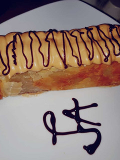 Una foto de Hojaldre con crema de café y ron