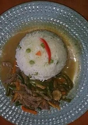 A picture of Chinese sauce and rice.