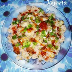 A picture of Chicken Sausage Rice with burnt Garlic and Chilli Oregano Sauce.