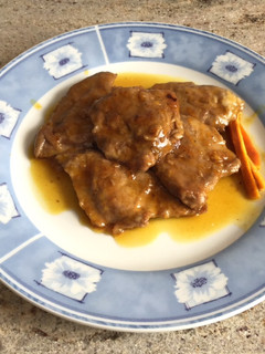 Una foto de Solomillo con salsa de naranja