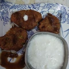 A picture of Vegi Tikki with Curd.