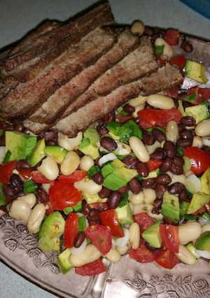 A picture of Grilled Steak Salad with Tomatoes and Avocado.