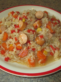Una foto de Arroz caldoso con salchichas Frankfurt