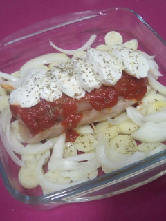Una foto de Versión de pechuga de pollo a la napolitana