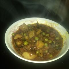 A picture of Dhabha style Aloo Mutter.