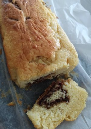 Une photo de Gâteau ultra tendre avec des tuiles chocolat