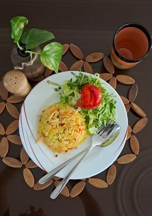عکسی از دستور هویجپلو با مرغ ریشریش