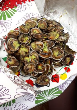 Una foto de Conchas asadas