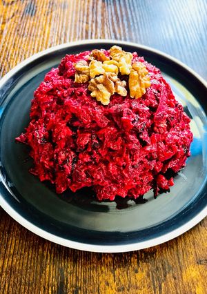 A picture of Beetroot salad with walnuts.