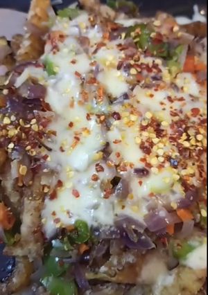 A picture of Chezee pizza 🍟 frice.