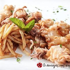 A picture of Fried calamari with chips.