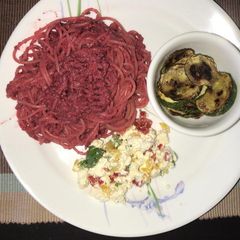 A picture of WHEAT SPAGHETTI IN BEETROOT PESTO, FETA CHEESE SALAD,.