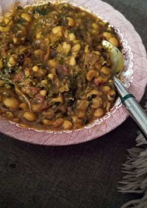 A picture of Beans porridge and ugwu leaves.