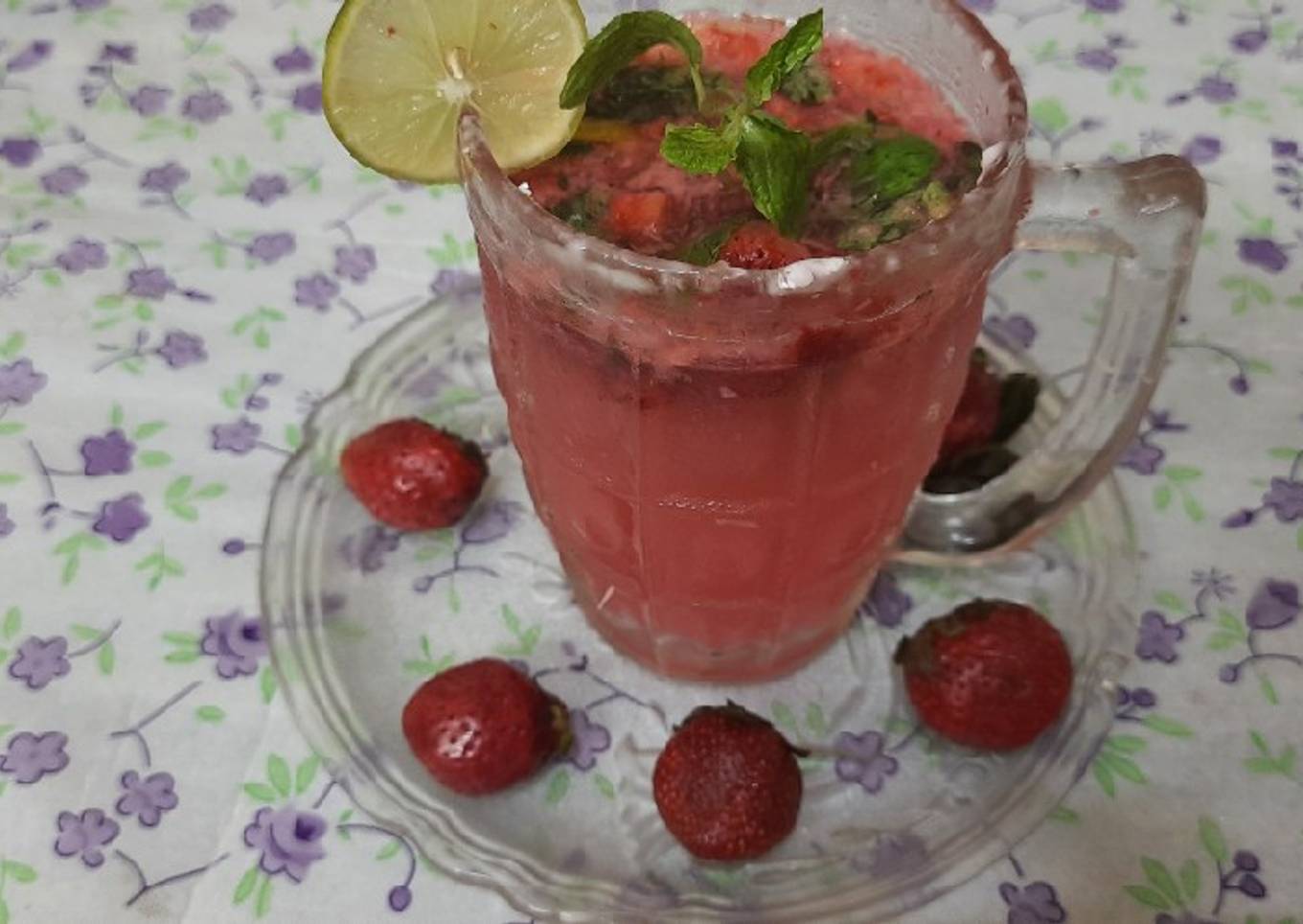 Fresh strawberry and strawberry crushed mojito