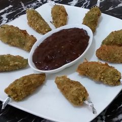 A picture of Stuffed Fried Chillies.