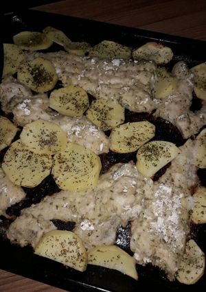 Una foto de Merluza con papas al horno